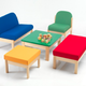 Children’s waiting room chairs and table in bright primary colours and
beech wood